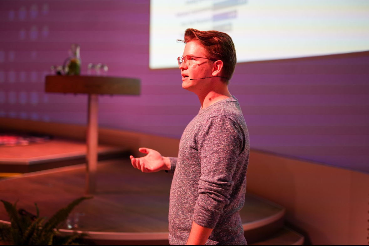 Nickolas Dowler presenting a keynote at the GTIC Conference